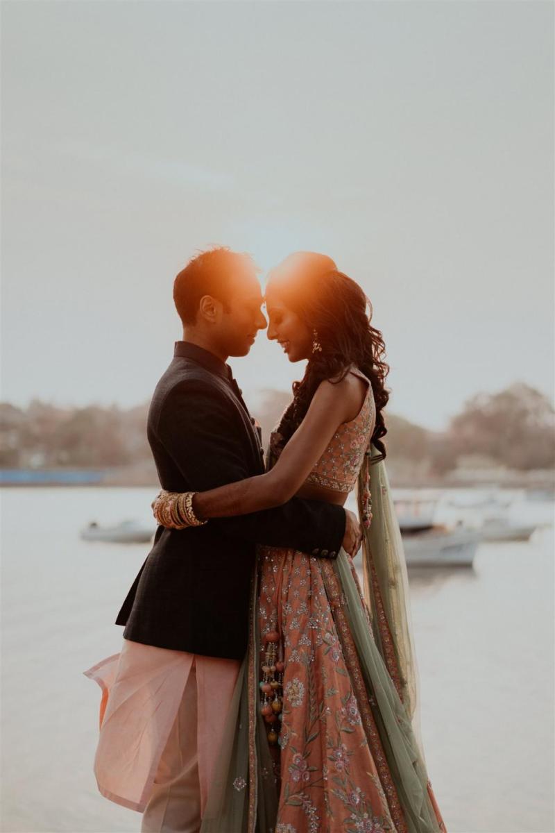 Romantic outdoor sunset wedding ceremony.